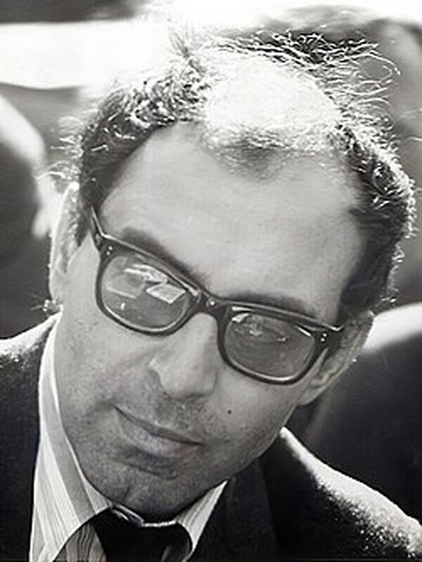 Portret Godard